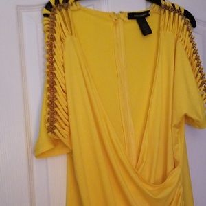 Yellow spring and summer dress. Cut out sleeves.
